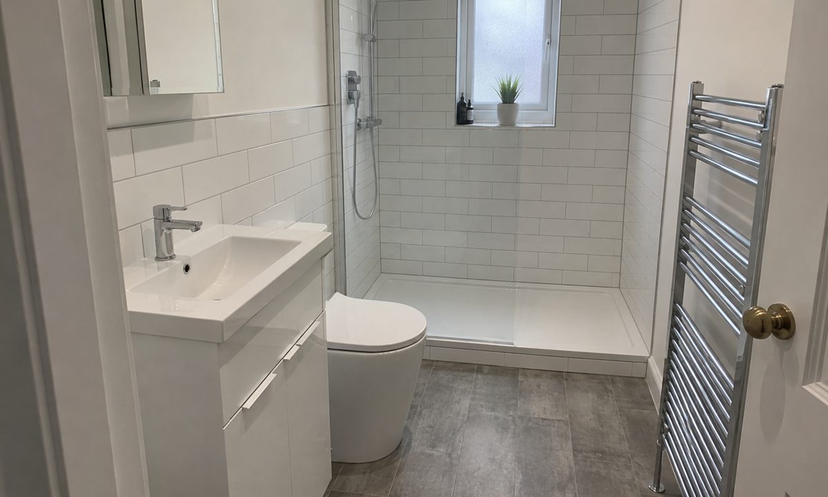 Newly fitted bathroom with walk-in shower installed in Woodley, Reading